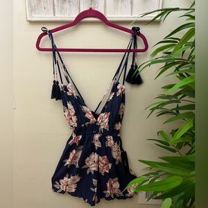 Lulu’s Backless Navy Floral Romper with Tasseled Tie Straps, Size Medium